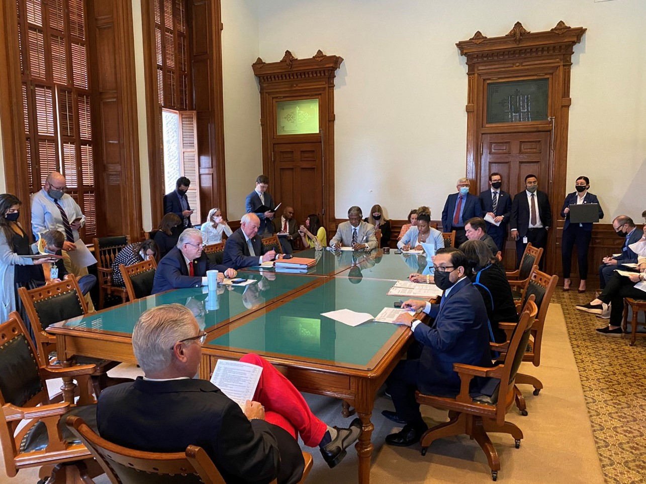 Rep. Dutton presides over a meeting of the HPE Committee